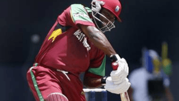 Image shows a cricketer from the West Indies team, making a play on a ball.